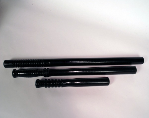 Black-painted wooden police clubs, available in bulk for manufacturers and large-scale production runs.